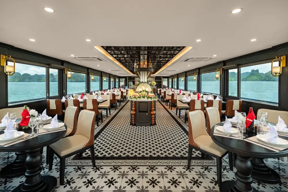 Elegant dining room aboard the Cozy Bay Premium overlooking the bay