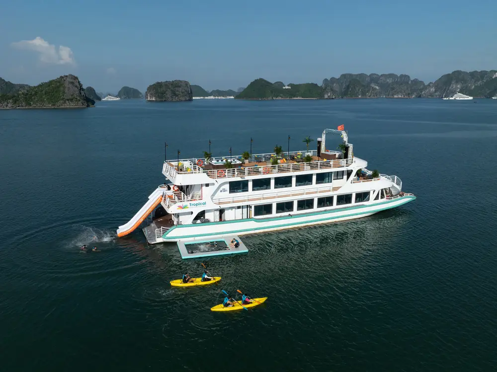Aerial view of the Tropical Cruise with water slide, kayaks and Lan Ha Bay karsts