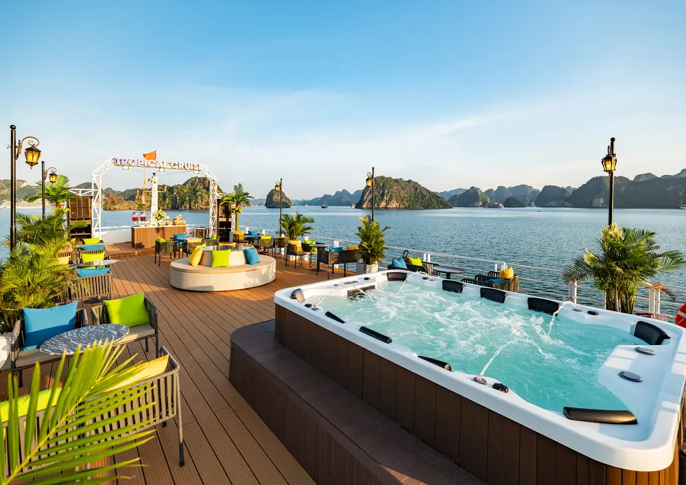 Rooftop Jacuzzi and lounge deck with Lan Ha Bay karsts in daylight
