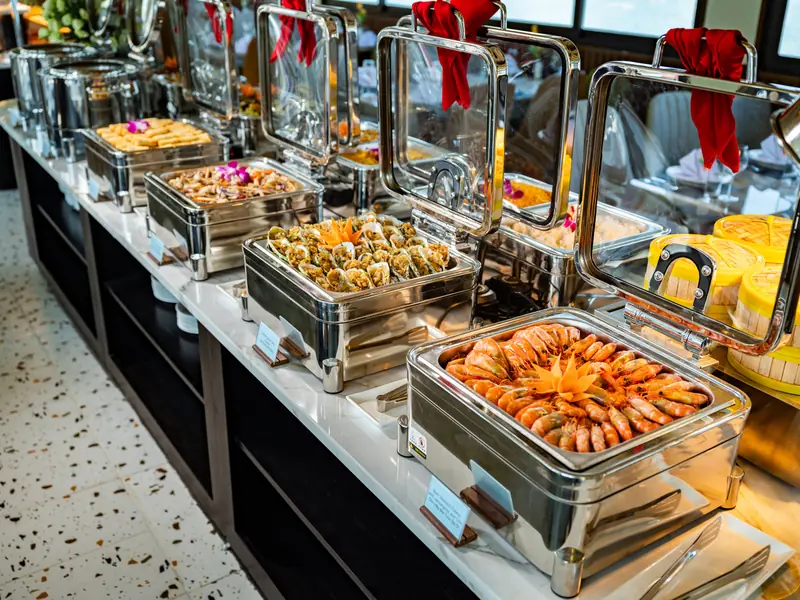 Buffet spread of shrimp and spring rolls aboard the Tropical Cruise