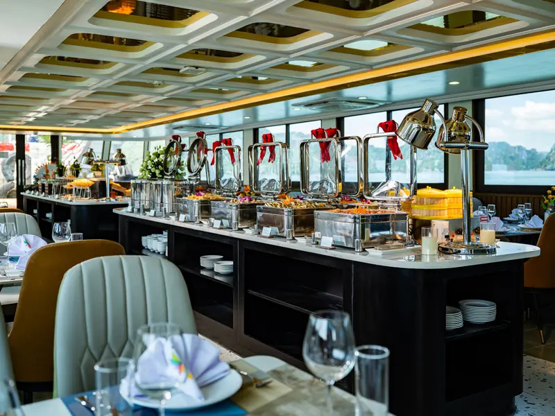 Buffet counter and dining tables aboard the Tropical Cruise