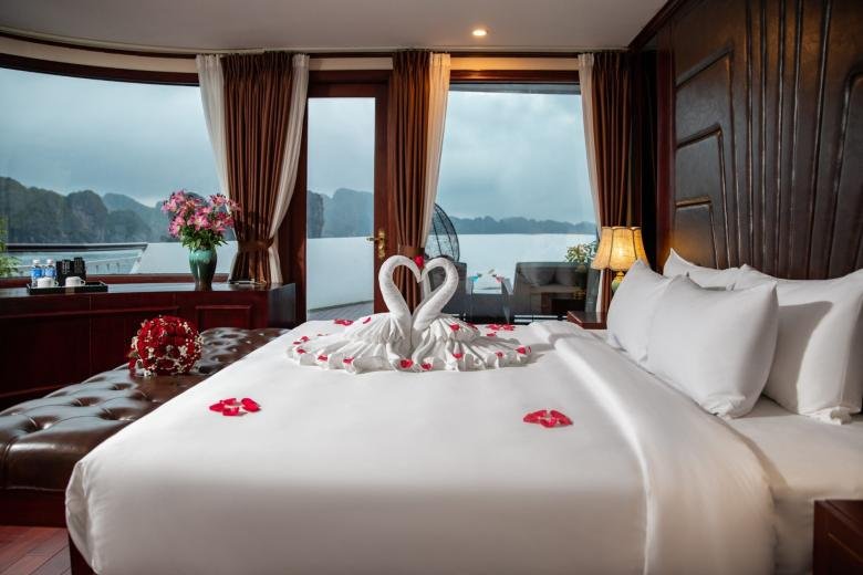 Romantic cabin with heart-shaped towel display and bay view