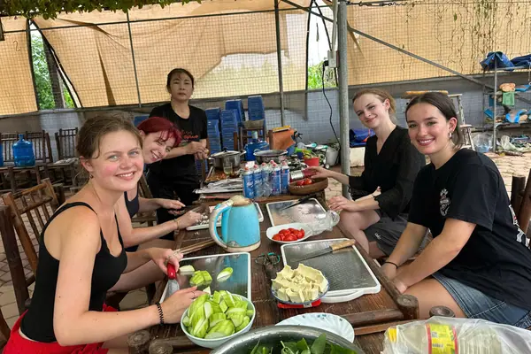 Preparing the ingredients together at the table