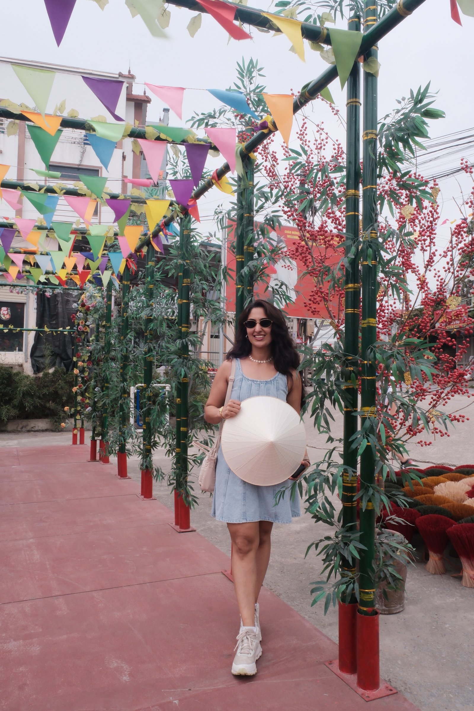 Guest in Ao Dai at Hanoi Train Street &mdash; photo 10