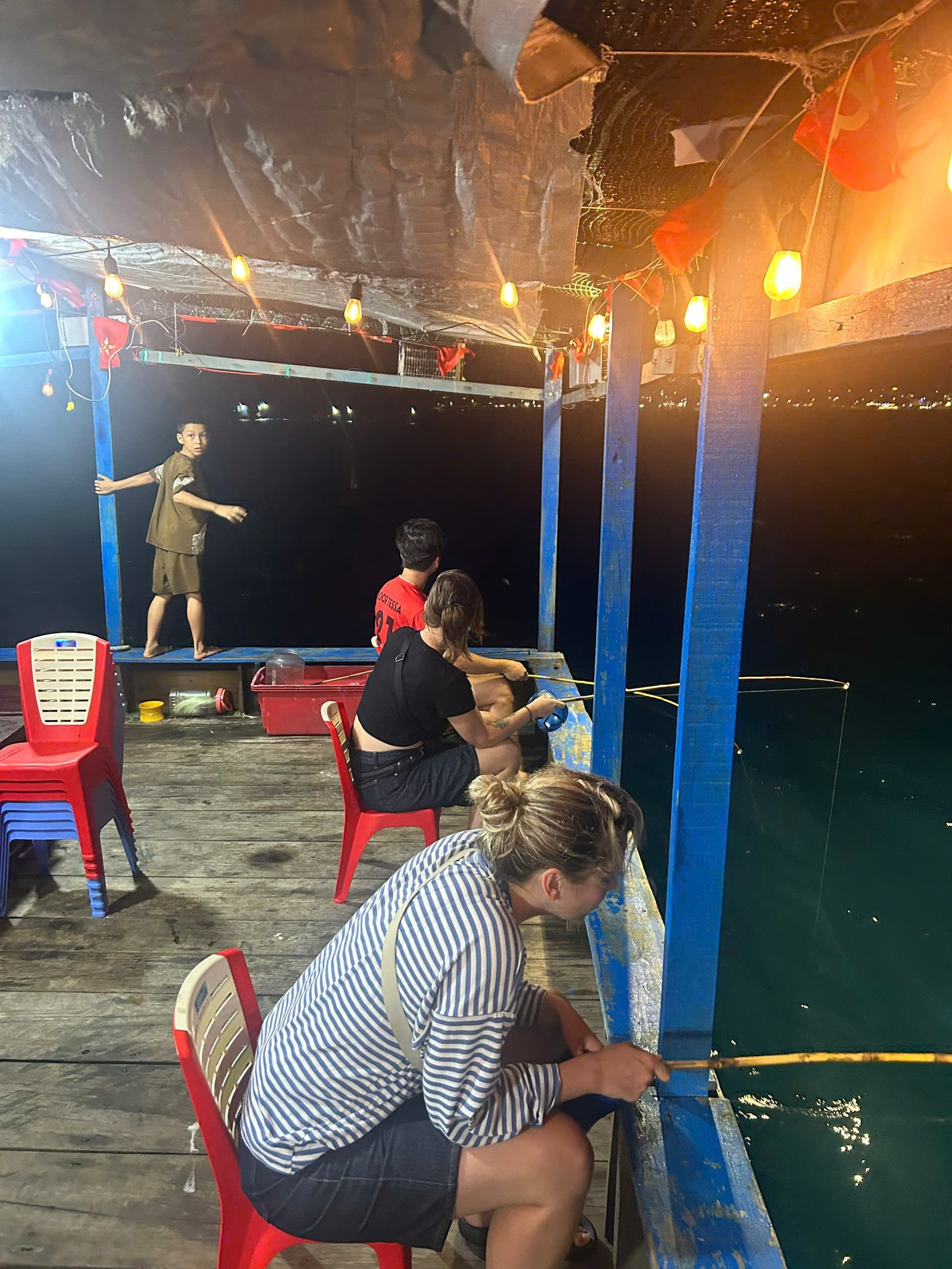Squid fishing boats lit up at night off Quy Nhon