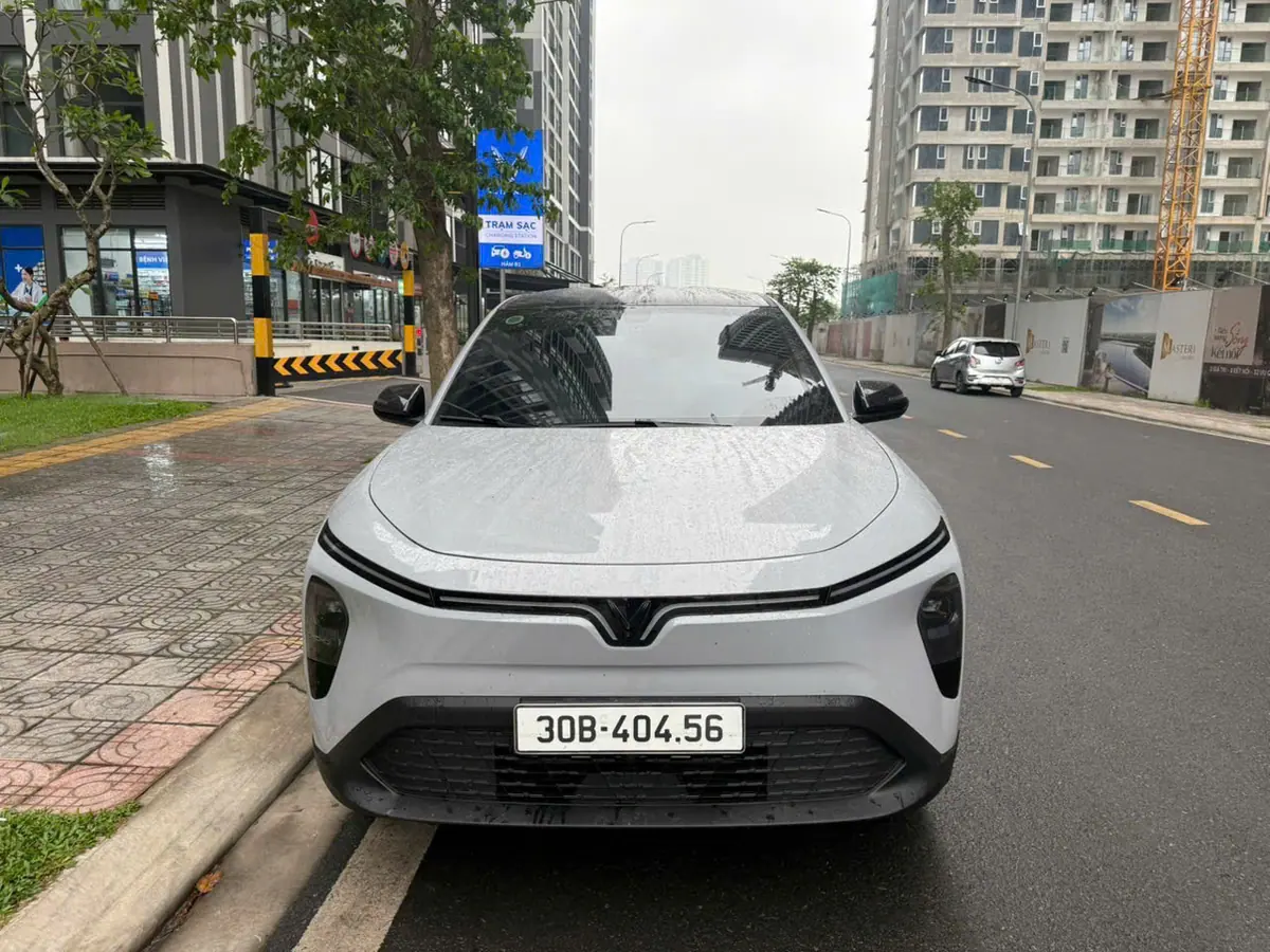 A white VinFast five-seat car