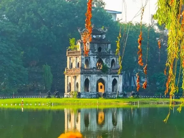 The Turtle Tower reflected in Hoan Kiem Lake