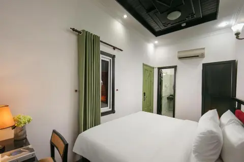 Standard Double: the room looking towards the window and the en-suite door