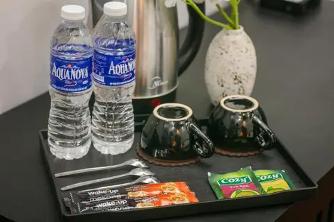 Superior room: kettle, bottled water, cups and tea on the tray